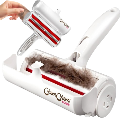 White ChomChom Roller handheld device with red bristles and a waste chamber filled with removed pet hair